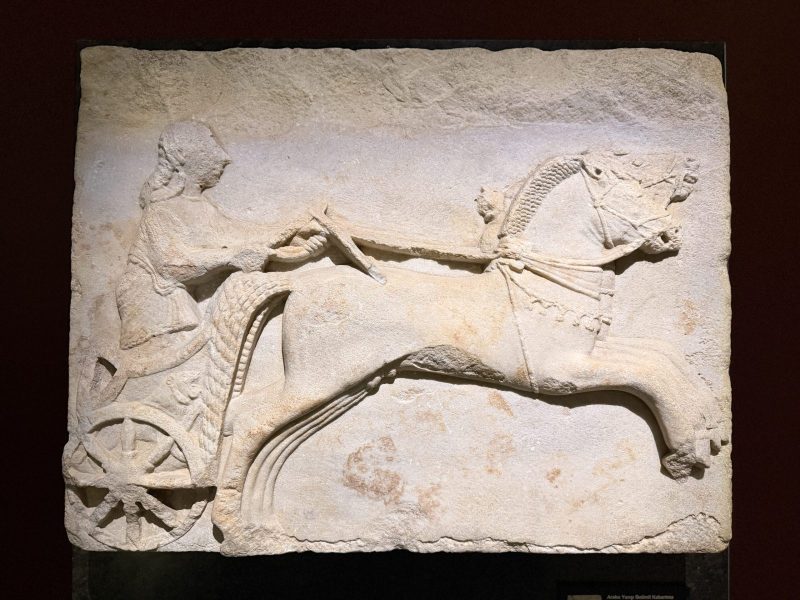 Marble relief depicting a chariot race