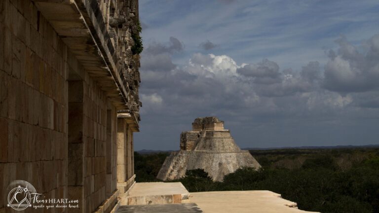 Outer Sight | Inner Sight: Kundalini, Uxmal, Althea Provost offers a view of the Pyramid of the Magician at Uxmal, Mexico, with dramatic clouds overhead and intricate Mayan stonework in the foreground.